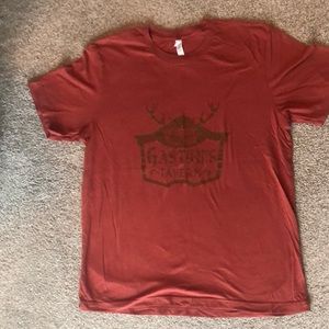 Men’s burgundy & brown (Disney’s “Gaston’s Tavern) Canvas brand t-shirt. Size XL